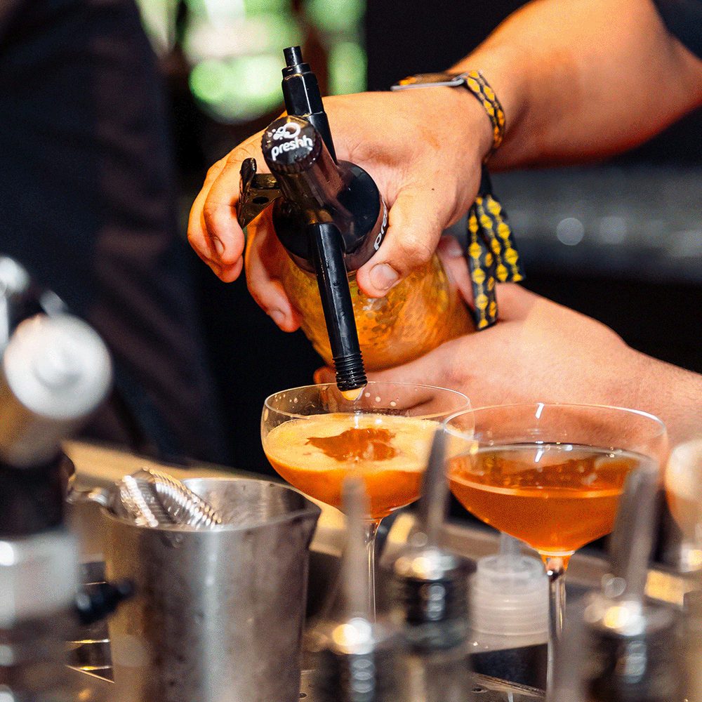 A World Class competitor preparing a carbonated cocktail with Preshh (6 of 15)